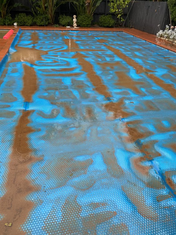 A pool blanket shows the stark effect of the red dust. 