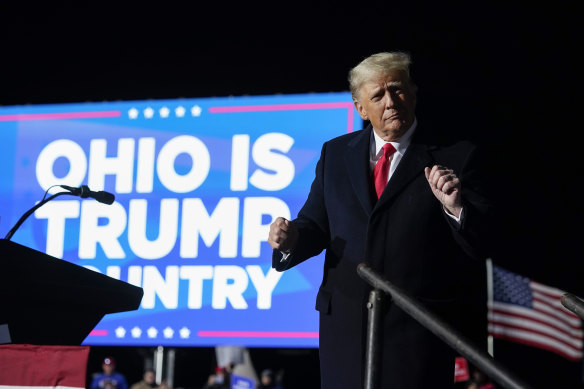 Former President Donald Trump dances after his speech at a campaign rally for Ohio Senate candidate JD Vance.