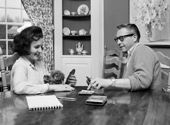 Allen Ludden and his wife Betty White plays a game of cards in their home in Westchester, N.Y. on April 29, 1965. 