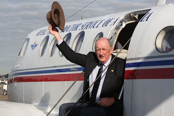 Tim Fischer, then national chairman of the Royal Flying Doctor Service, at Bankstown airport before flying off on a nationwide tour of RFDS services in 2008. 