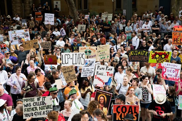 Climate protestors at the rally against Scott Morrison at Town Hall.