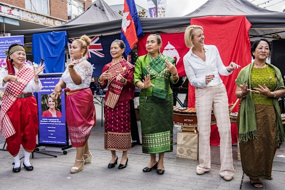 Kristina Keneally dancing with members of the Cambodian community in Cabramatta.