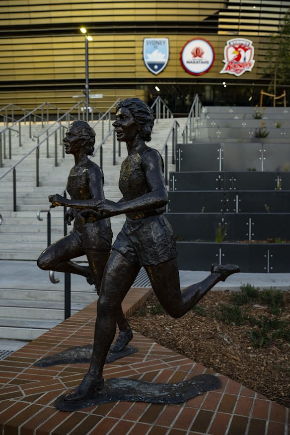Athletic sculptures outside the ground.