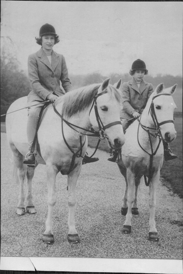 Princess Elizabeth celebrates her 14th birthday with a horse ride accompanied by her sister, Princess Margaret, in Windsor Great Park, on June 3, 1940.