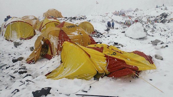 This photo provided by Azim Afif shows the scene after an avalanche triggered by a massive earthquake swept across Everest Base Camp, Nepal on Saturday, April 25, 2015.