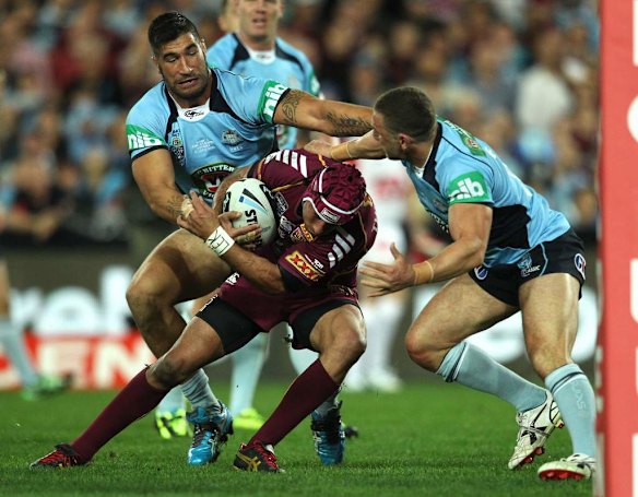 Maroons Johnathan Thurston lunges to score.