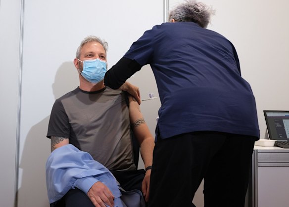 Victorian Chief Health Officer Brett Sutton receives his first COVID-19 vaccination at the Royal Exhibition Building in Melbourne, Wednesday, April 21, 2021. 