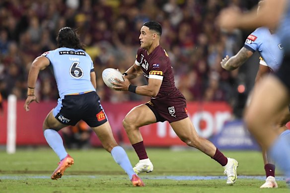 Valentine Holmes of the Maroons runs the ball during game one of the 2021 State of Origin series.