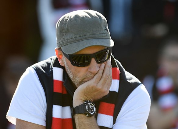Fans watching the broadcast on the oval.