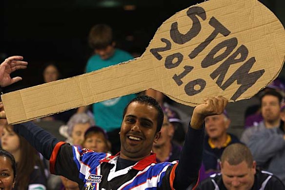 A Warriors fan holds up a wooden spoon for the Storm.