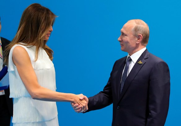 First Lady Melania Trump was sent in to try to wrap up the meeting.