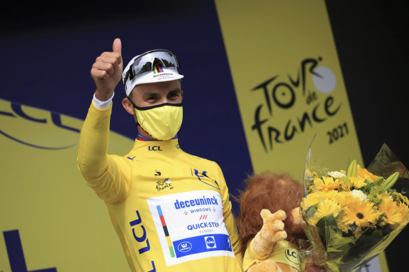 France’s Julian Alaphilippe wears the yellow jersey. 