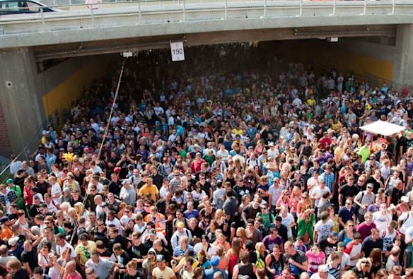 Revellers crowd a tunnel where later panic broke out during the Love Parade in Duisburg, Germany.