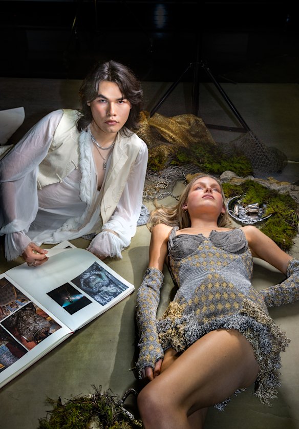 Fashion designer Samuel Lewis with model Sascha Rose from Chadwick models in one of his designs based in part on medieval chain mail. 