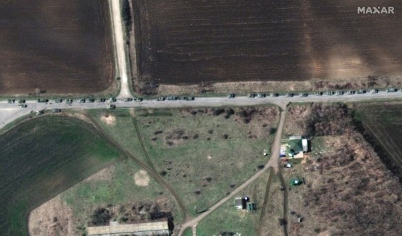 A satellite image shows a convoy of Russian military vehicles along a highway near Bilokurakyne, Ukraine.