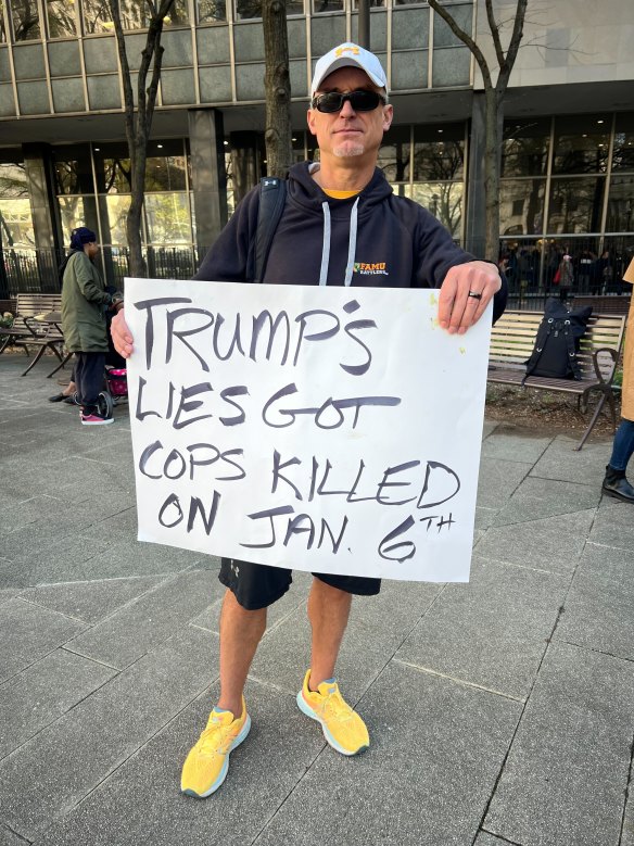 Washington State police officer, Joel Anderson, outside the New York Court on the first day of Donald Trump’s hush money trial.