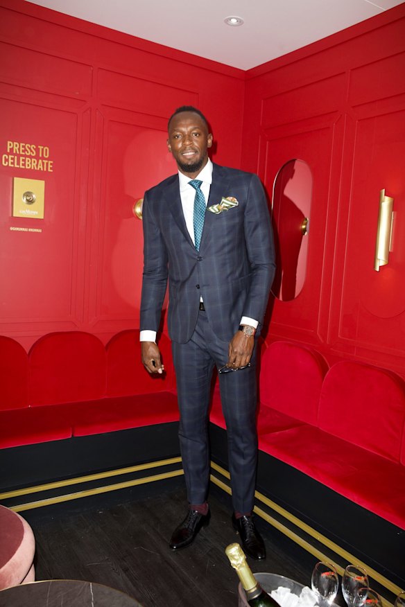 Usain Bolt attends the Mumm marquee on Melbourne Cup Day at Flemington Racecourse.