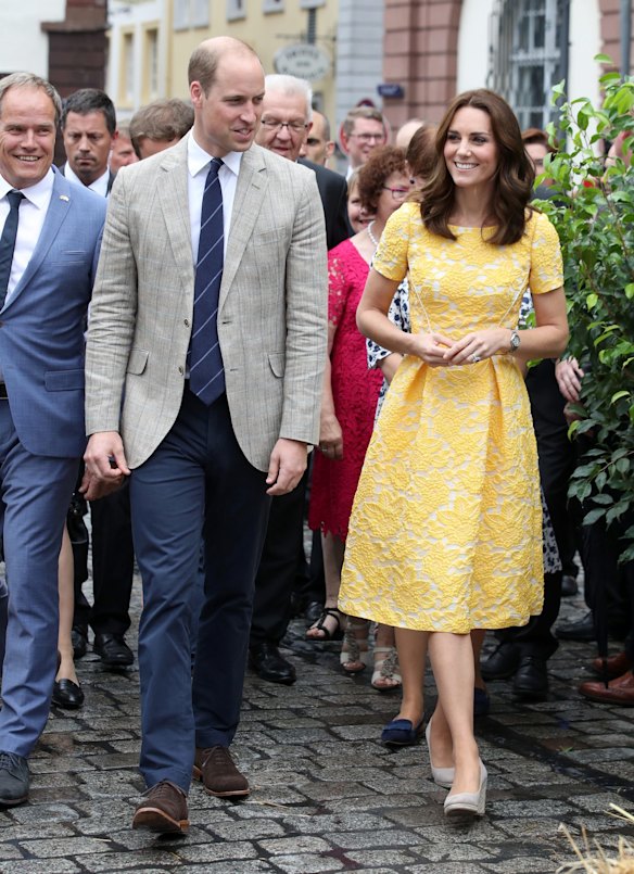 July 20- Kate wore a bespoke golden yellow dress by fashion favourite Jenny Packham, with an a-line skirt and floral overlay. She also wore her favourite Monsoon 'Fleur' espadrilles, as well as an Alexander McQueen taupe box bag and Oscar de la Renta Pearl Sun Star Button earrings.