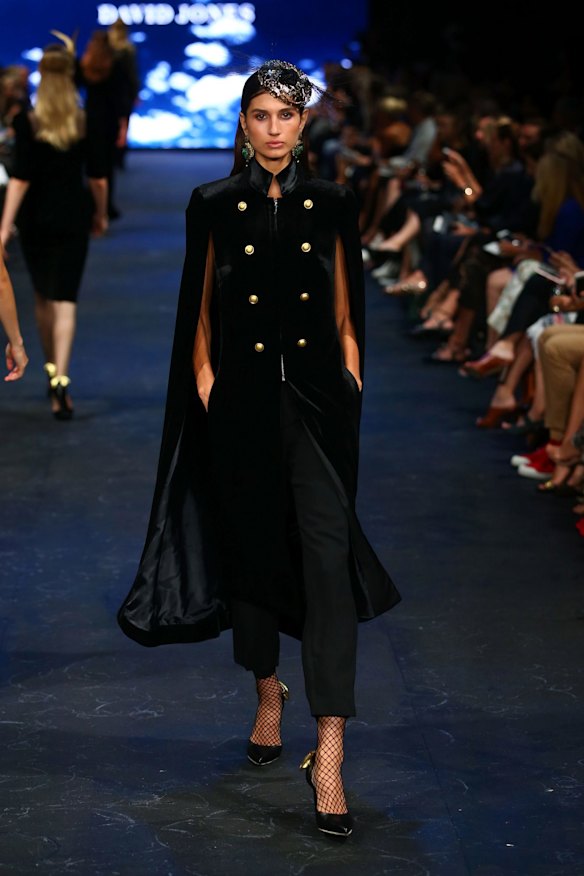 A model showcases designs by Carla Zampatti on the runway at the David Jones Autumn Winter 2017 Collections Launch at St Mary's Cathedral Precinct, Sydney, on February 1, 2017.