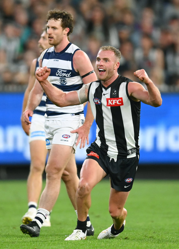 New Magpie Tom Mitchell celebrates a goal against Geelong.