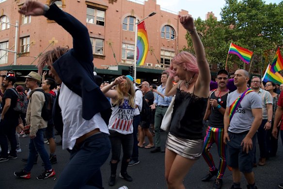 Celebrations continue as people rally down Oxford st, Darlinghurst.