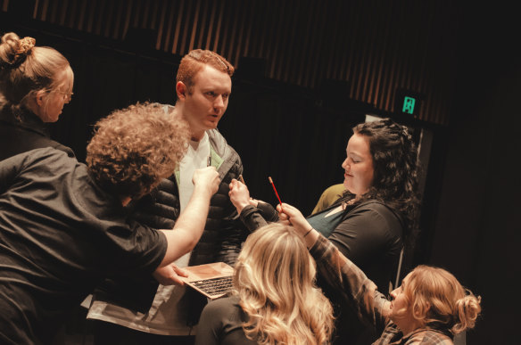 The ensemble cast of Work of Art a musical about the Sydney Opera House construction.