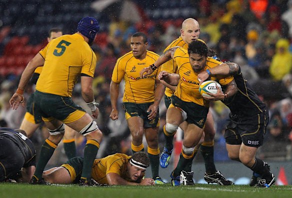 Digby Ioane of Australia pushes forward during the International Test match between the Australian Wallabies and Scotland at Hunter Stadium on June 5, 2012 in Newcastle, Australia.