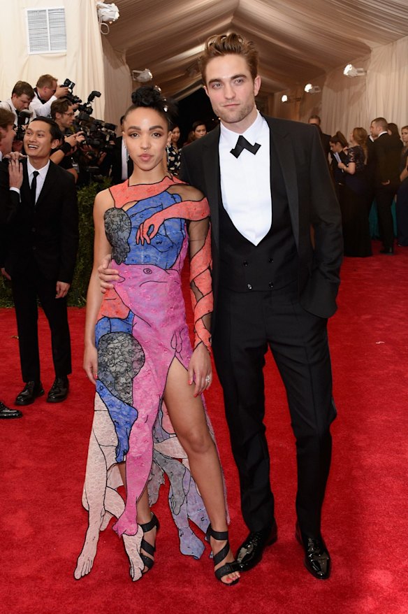 \Robert Pattinson (R) and FKA Twigs attend the "China: Through The Looking Glass" Costume Institute Benefit Gala at the Metropolitan Museum of Art on May 4, 2015 in New York City.