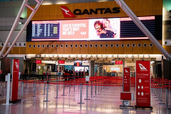 An empty domestic Sydney Airport terminal, as Sydney has 12 more days of a two week lockdown.