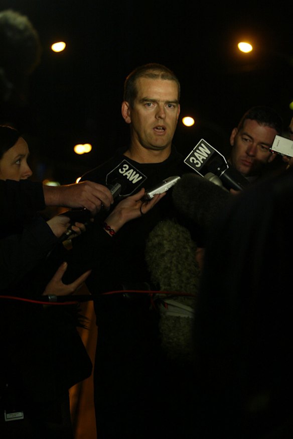 Simon Overland at the murder scene of Lewis Moran on March 31, 2004.  Photo by Angela Wylie.