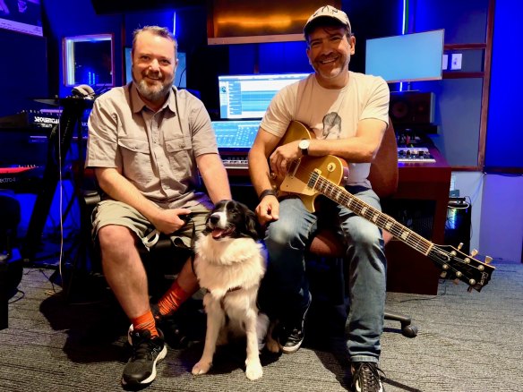 Smooth operators: Andrew Wright and Miguel  Laborde with Mila the border collie.