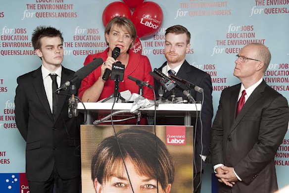 Anna Bligh makes her concession speech with sons Oliver and Joe and her husband Greg Withers at ALP headquarters in Southbank. Photo: Harrison Saragossi