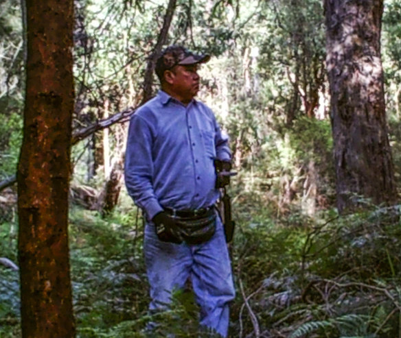 The second man, aged in his 40s to his 50s. 