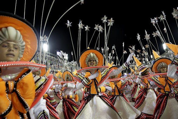 A performer from the Viradouro samba school parades during Carnival celebrations at the sambadrome in Rio de Janeiro, Brazil.