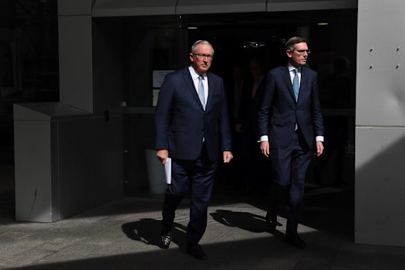 Health Minister Brad Hazzard and NSW Treasurer Dominic Perrottet arrive at a daily coronavirus press conference.