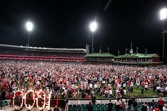 The crowd take over the SCG in celebration.