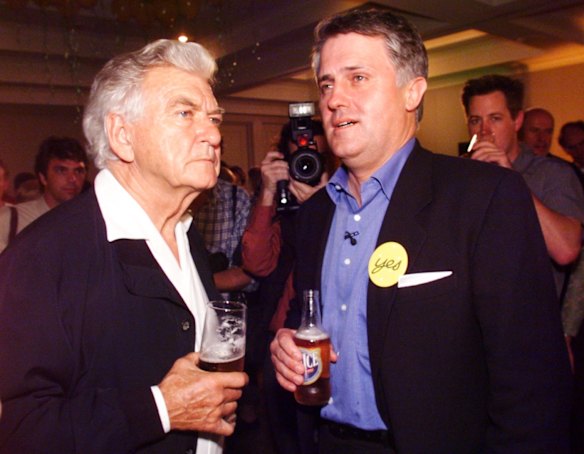 Malcolm Turnbull and Bob Hawke share a beer as they face the inevitable defeat of the republic referendum in 1999.
