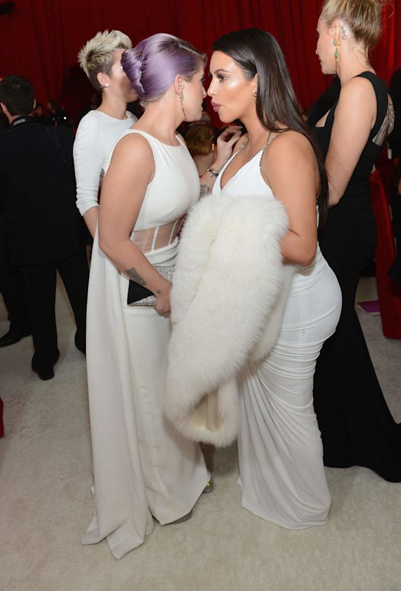 TV personalities Kelly Osbourne and Kim Kardashian attend the 21st Annual Elton John AIDS Foundation Academy Awards Viewing Party.