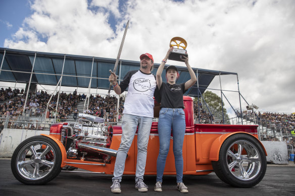 Rick Werner from the Gold Coast celebrates with his daughter Danielle after his 1932 Ford pickup hotrod was named the 2019 Summernats Grand Champion