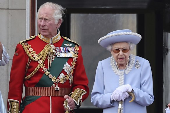 Prince Charles and Queen Elizabeth II watch Trooping the Colour.