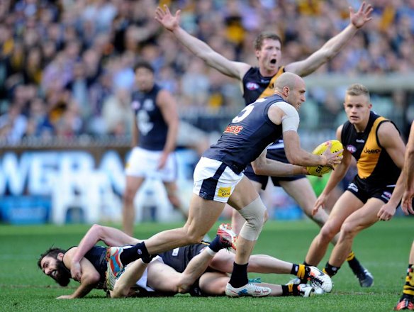 Carlton's Chris Judd gets away.