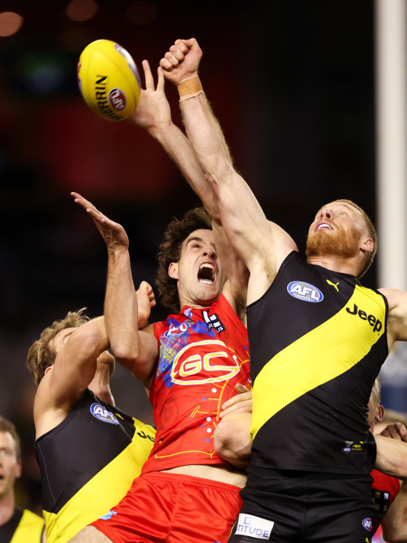 Ben King leaps for a mark.