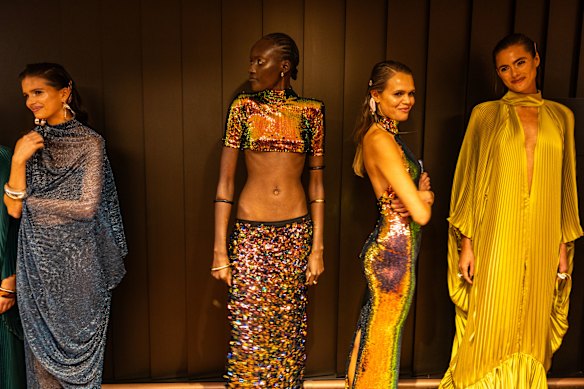 Models backstage, including Taylor Hill (far right) and Billie Jean (second from the right), for the L’Idee Woman show.