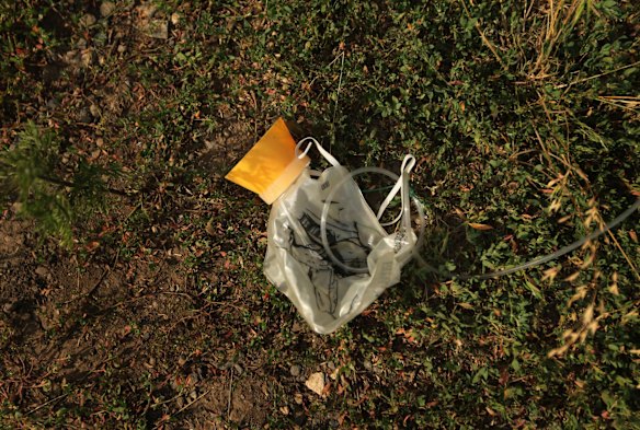 An oxygen mask from Malaysian flight MH17 lays in a field near the village of Grabovka in the self proclaimed Donetsk Republic, Ukraine. All 298 people onboard the plane were killed when the plane was shot down over East Ukraine. 2nd August, 2014. Photo: Kate Geraghty