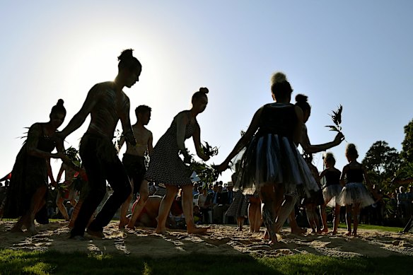 Koomurri dancers perform during the Arrival of Fire at the Australia Day Wugulora Morning Ceremony.