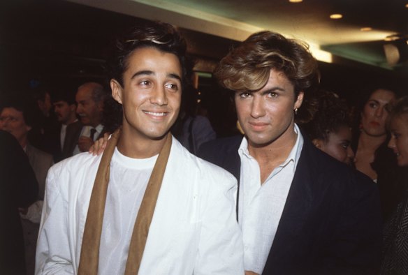 English pop stars Andrew Ridgeley and George Michael of Wham at the film premiere of 'Dune'. 
