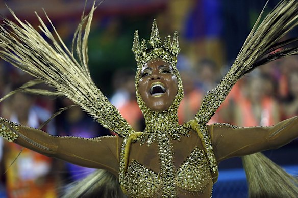 RIO CARNIVAL 2019 PHOTOS: A performer from the Viradouro samba school parades during Carnival celebrations at the sambadrome in Rio de Janeiro, Brazil.