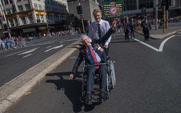 Bruce Robertson, 99 with his great grandson Flinlay Thornton. Anzac Day March, Sydney, 2019.