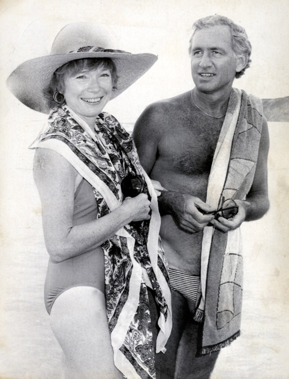 Federal MP Andrew Peacock and film star Shirley Maclaine strolling on a beach near Portland. Jan 24, 1982.