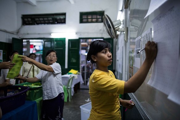 Staff count the votes at polling station after Myanmar's first free and fair election Yangon, Myanmar.